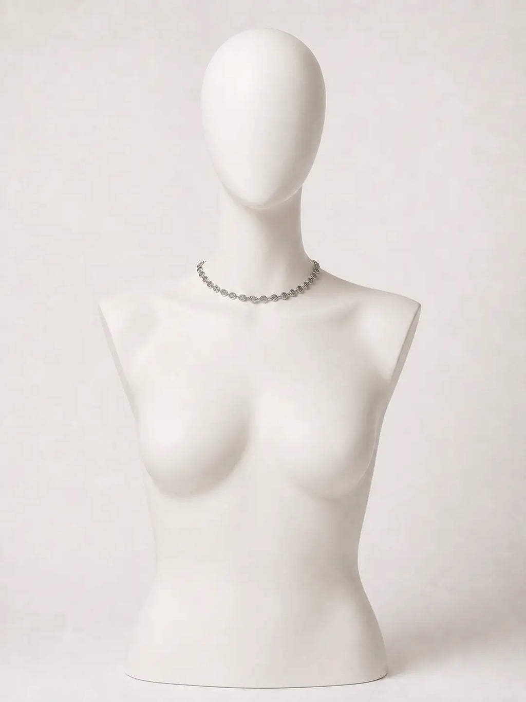 Collana argentata con medaglioni martellati