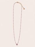 Collana dorata con fiore e cristalli lilla